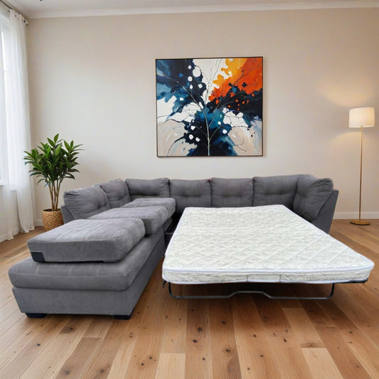 Ashleys Furniture Pitkin Sectional Couch with Pullout Bed