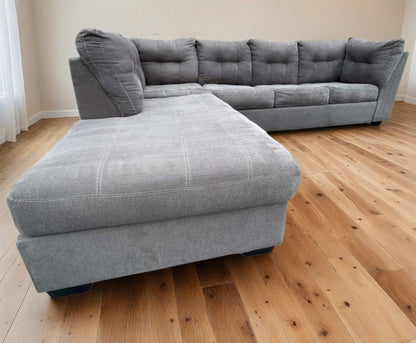 Ashleys Furniture Pitkin Sectional Couch with Pullout Bed